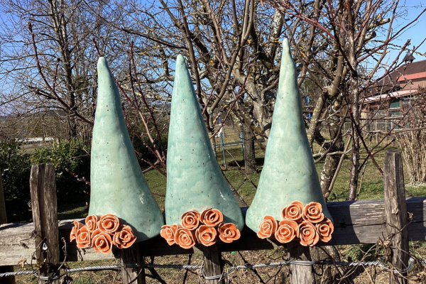 Zaunhocker mit Röschen